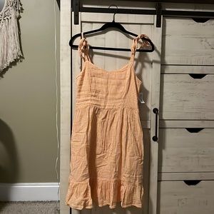 Orange and white checkered dress